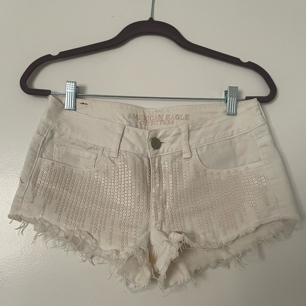 AE off-white sequined denim shorts